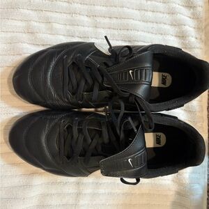 Nike women’s Black cleats